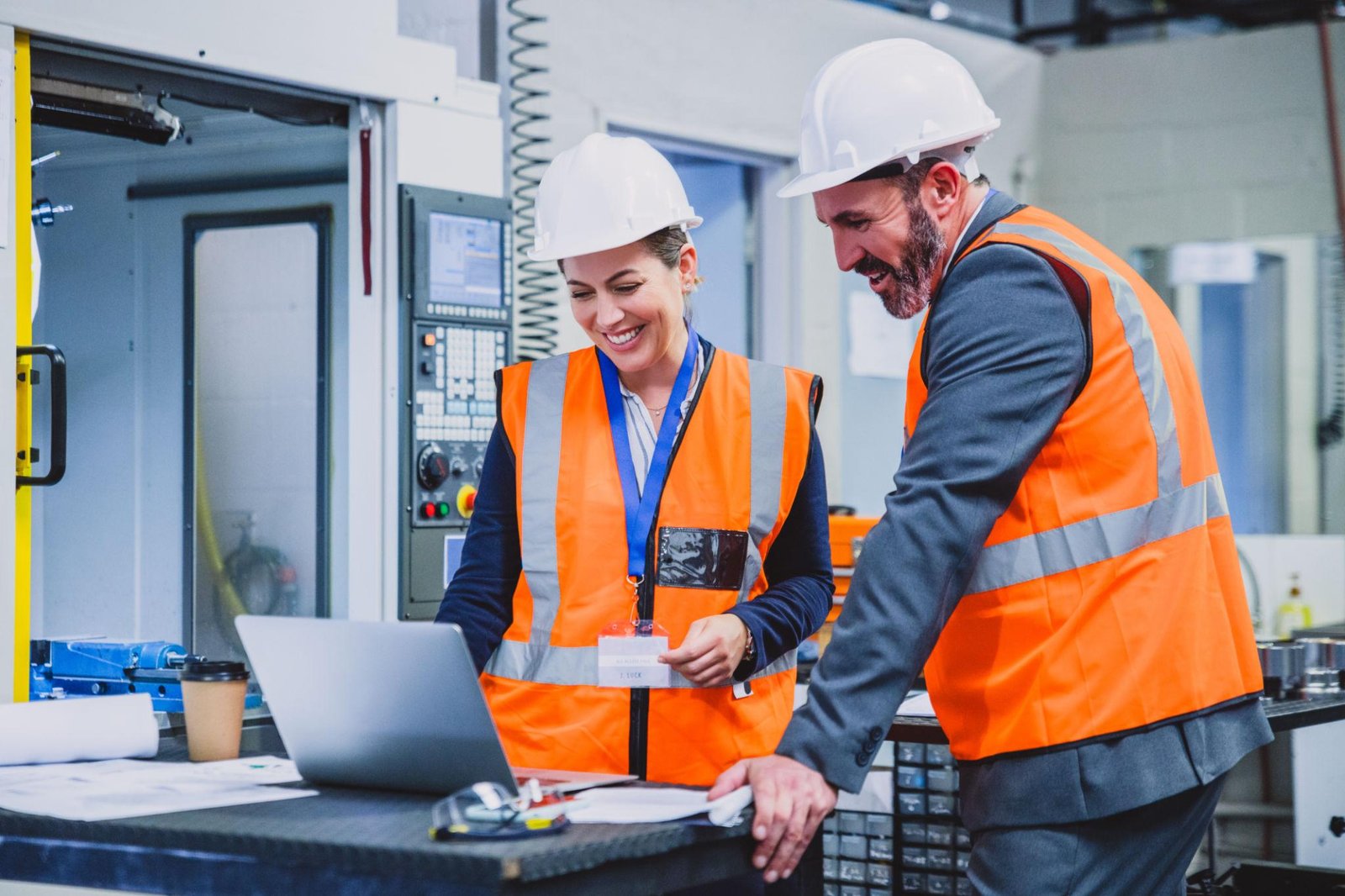 Technical experts working with industrial equipment